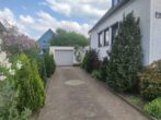 Einfamilienhaus mit Gartenidylle in Westercelle: Komfort und Gemütlichkeit vereint (MA-6271) - Einfahrt + Garage